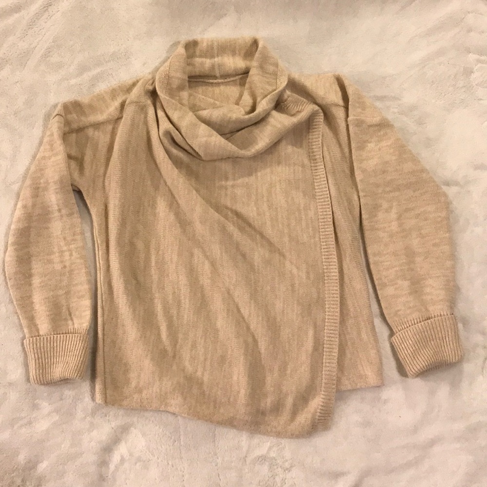 Wrap sweater with snaps.